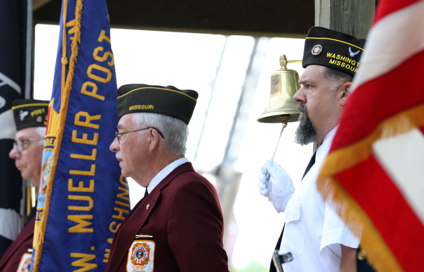 Tony Goughenour rings a memorial bell